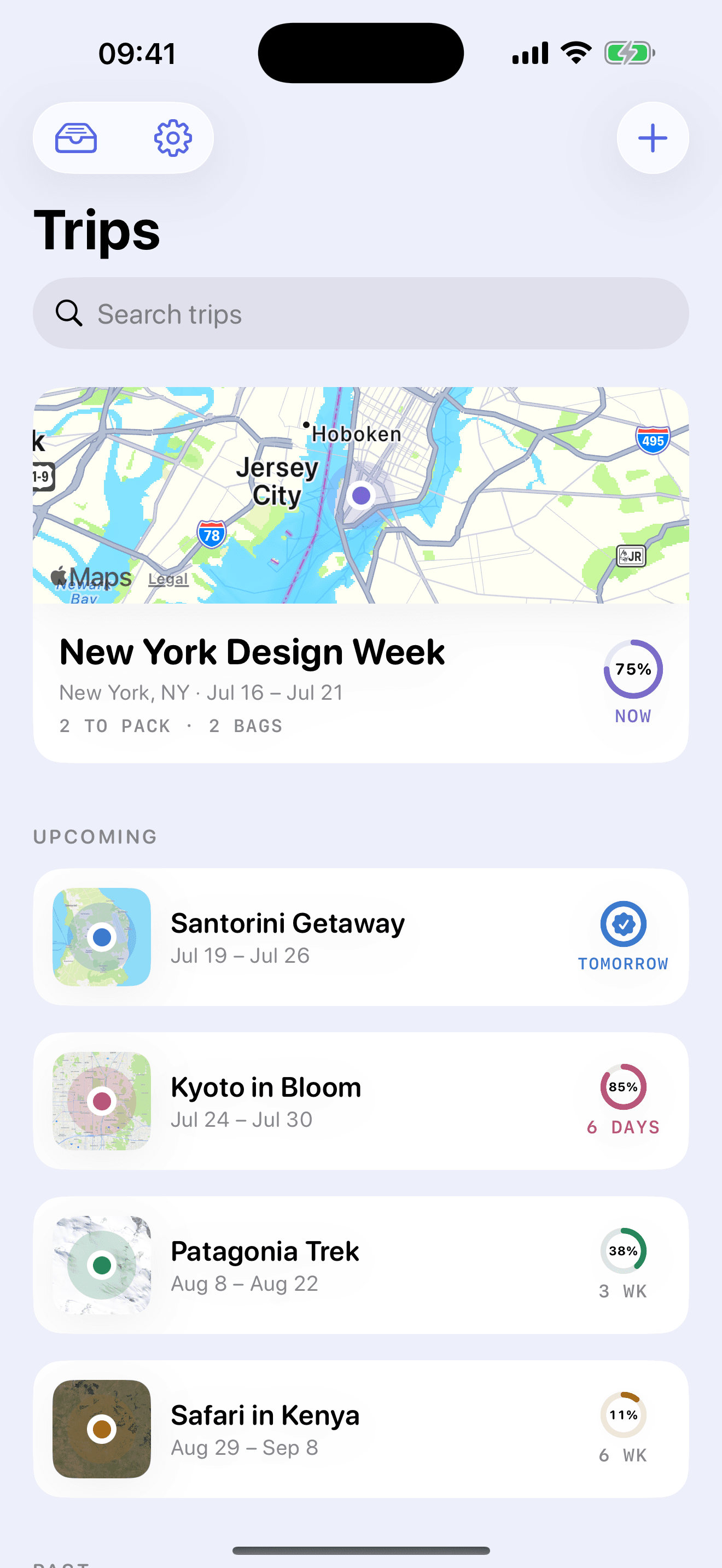 Packerly home — upcoming trips as wallet passes with map heroes, countdowns, and readiness rings